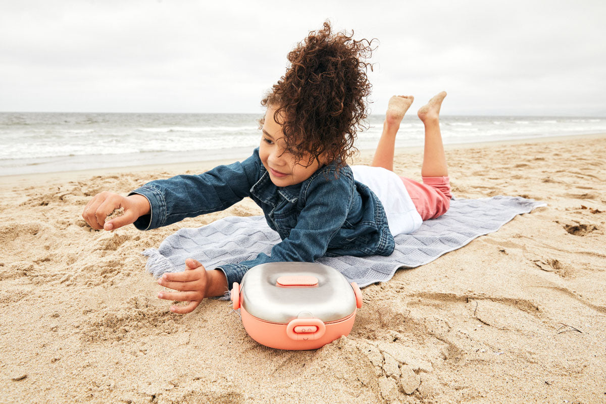 Girl Playing at the Beach with her Winck Stainless Steel Bento Lunch Box for Kids